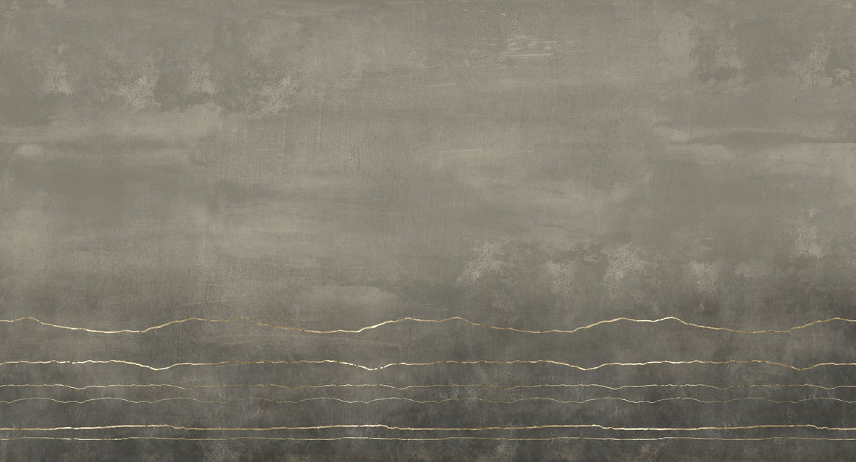 A square sample of textured gray wallpaper or adhesive contact paper featuring a mottled concrete-like finish with horizontal metallic gold veining near the bottom.
