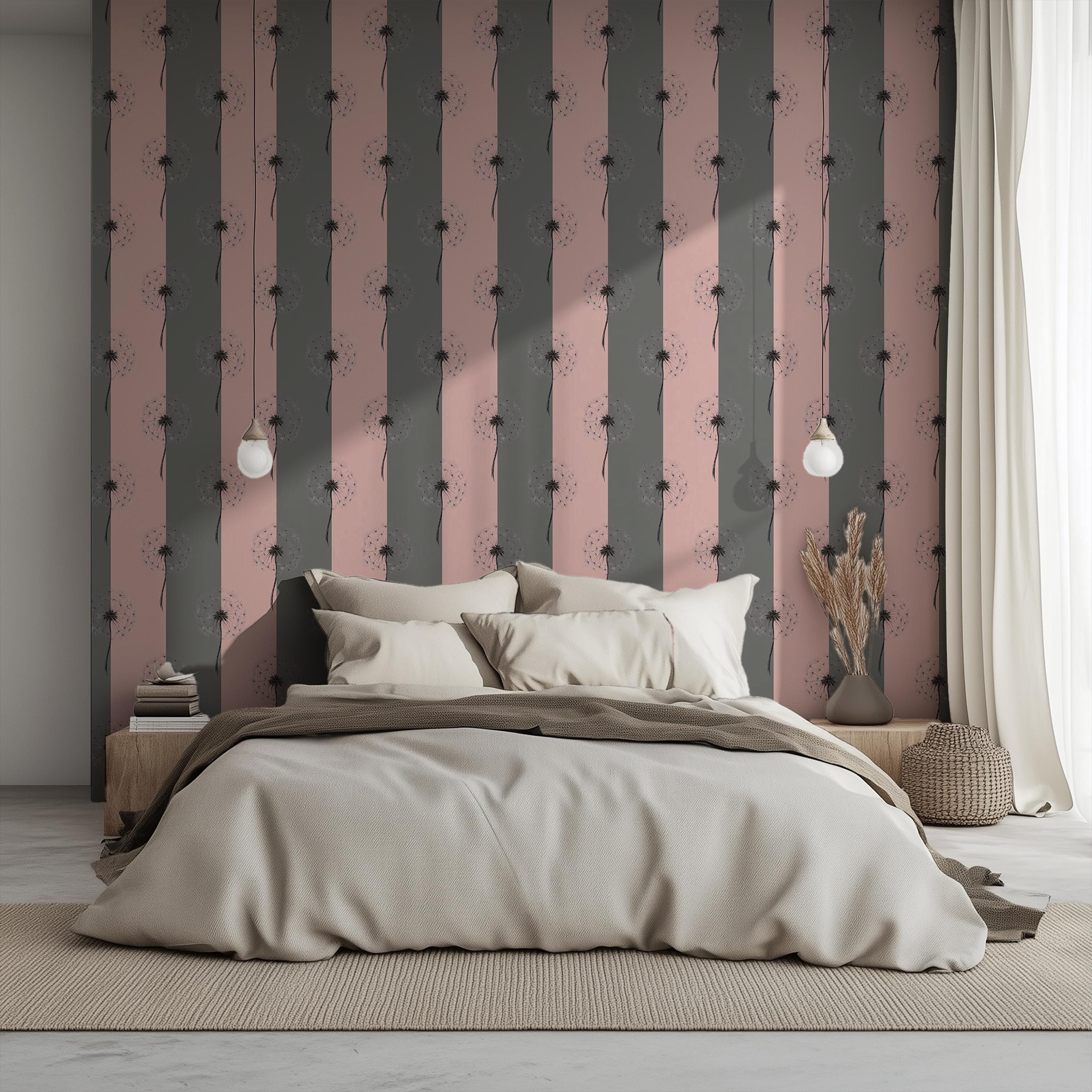 Modern bedroom with a large bed against a decorative wall with vertical stripes.