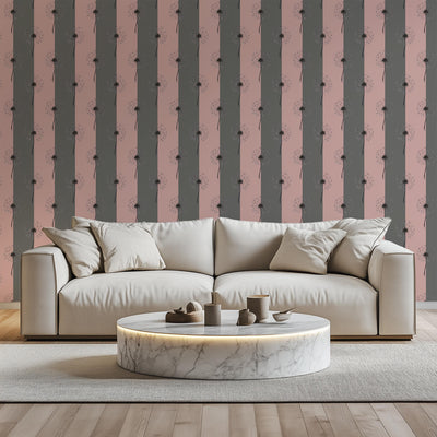 Beige sectional sofa with a marble coffee table against a striped wall.
