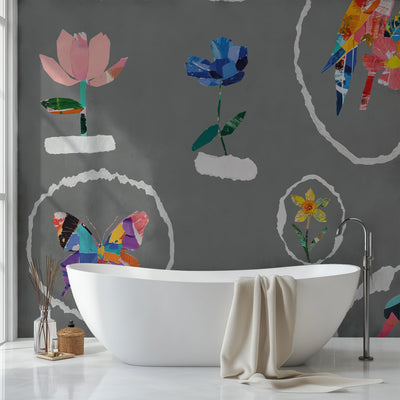 Bathroom with a white bathtub against a gray wall featuring colorful floral and butterfly designs.