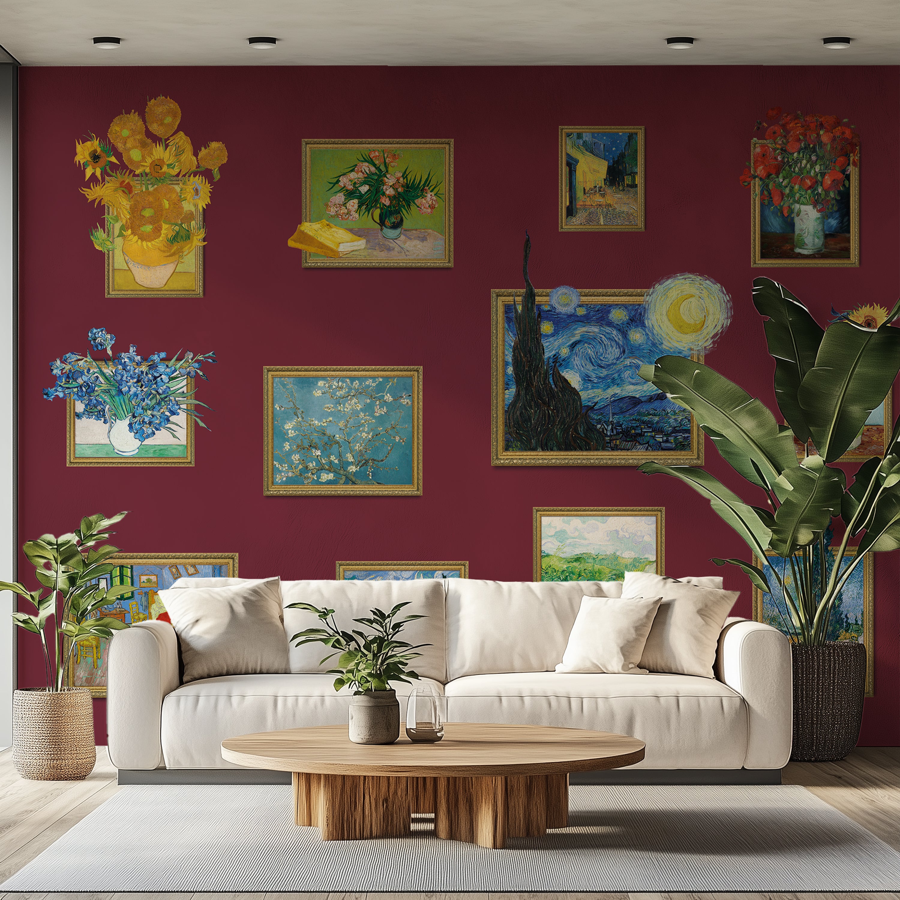 Living room with a white sofa, wooden coffee table, and various framed paintings on a red wall.