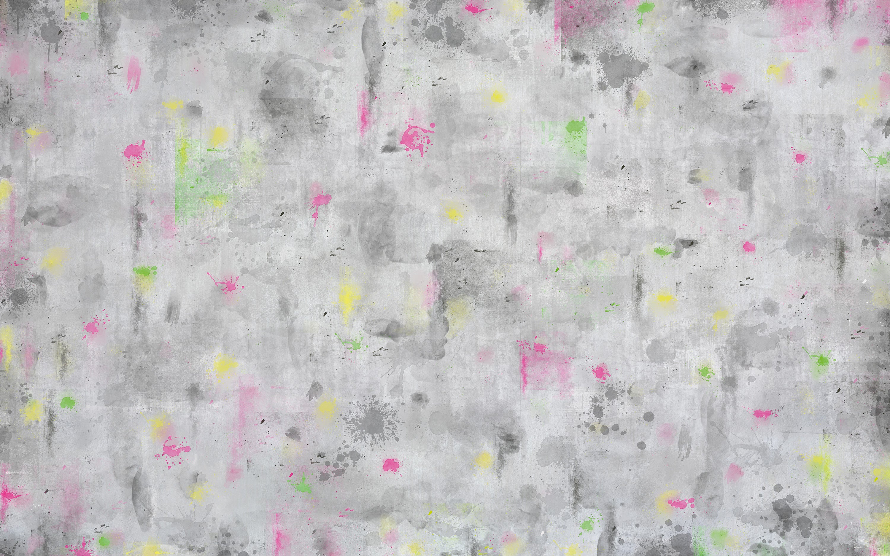 Textured gray surface with colorful abstract patterns