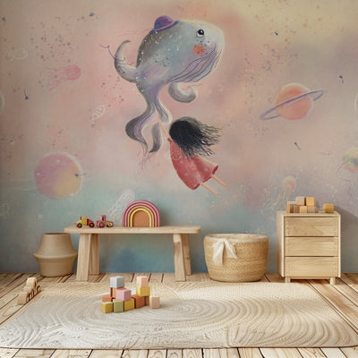 Children's room with a large wall mural of a girl and a fish, wooden furniture, and toys.