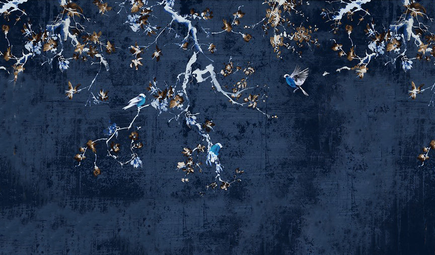 Aerial view of birds flying over a dark blue landscape with scattered lights.