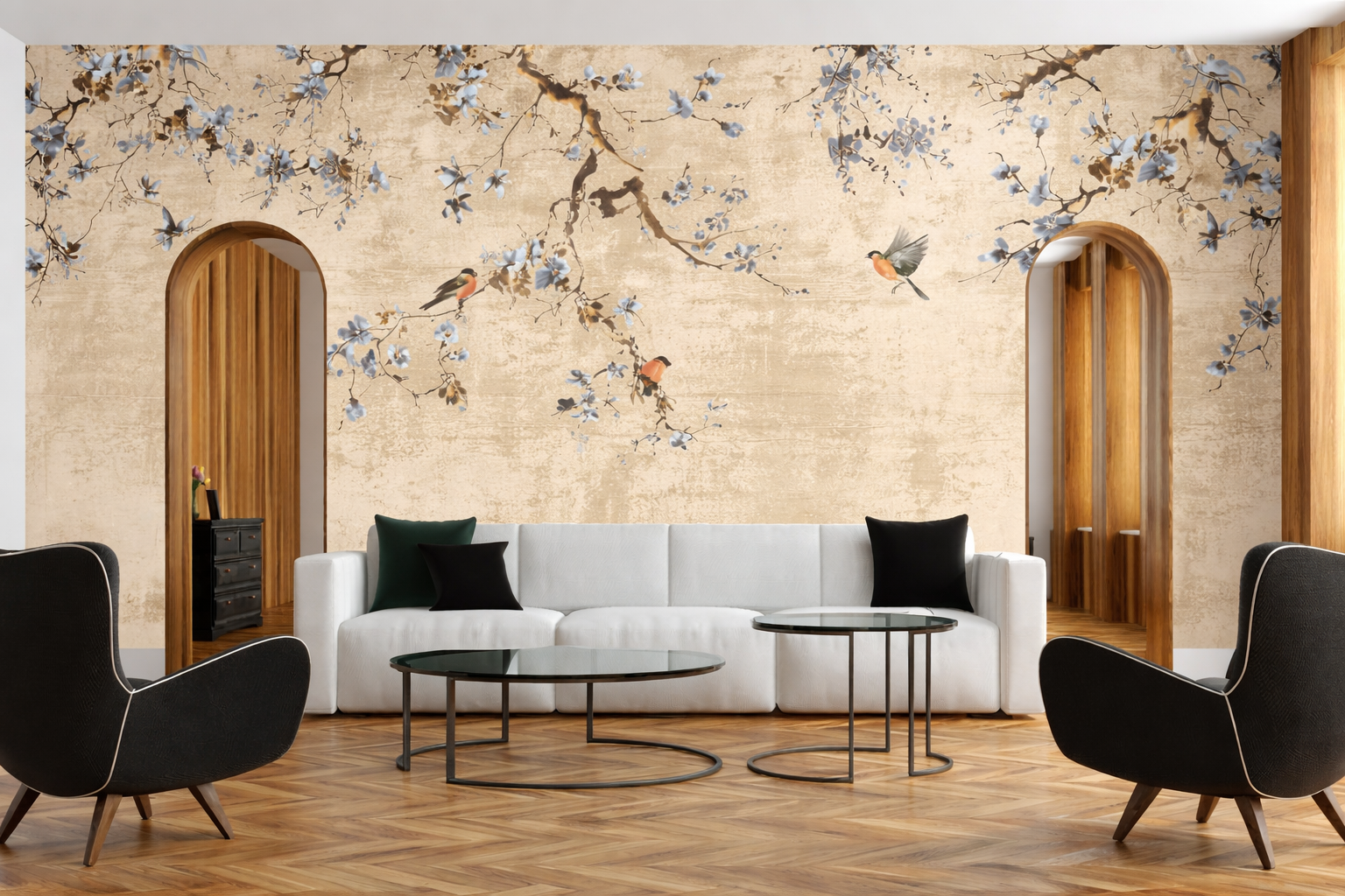 Living room with floral wall mural, white sofa, and black chairs.