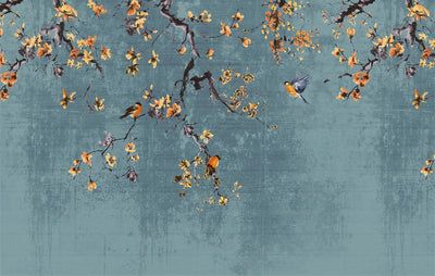 Decorative wallpaper with floral branches and birds on a textured blue background