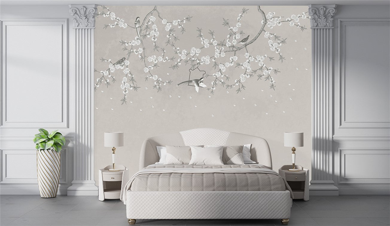 Modern bedroom with white bed, nightstands, and decorative wall art.