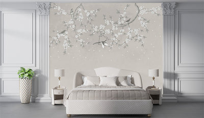 Modern bedroom with white bed, nightstands, and decorative wall art.