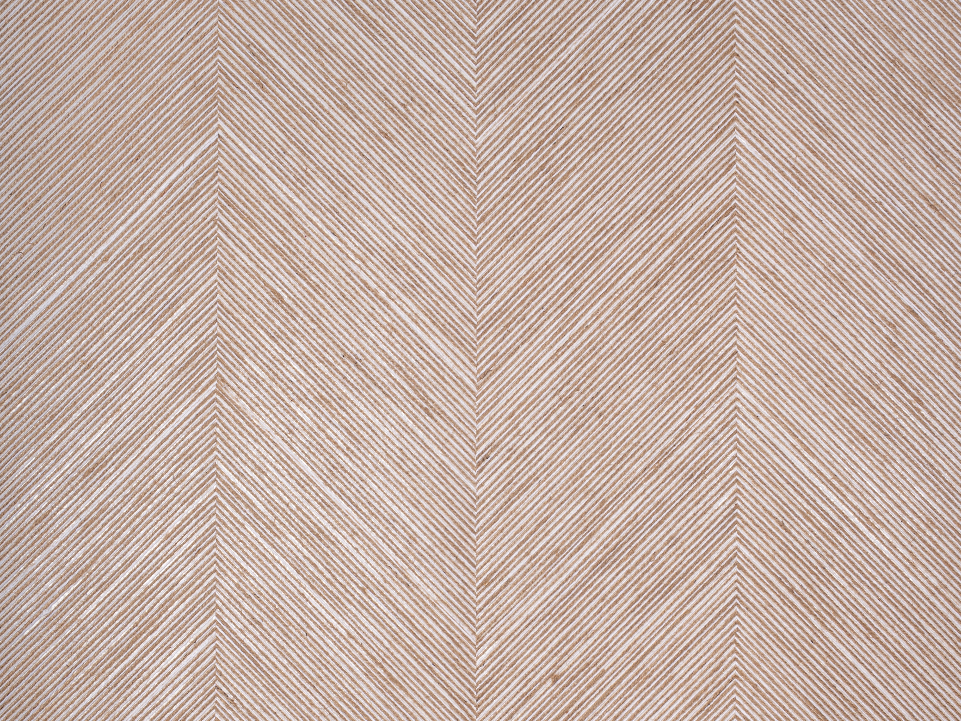 Terra Chevron textured grasscloth wallcovering – shown as a full-wall feature